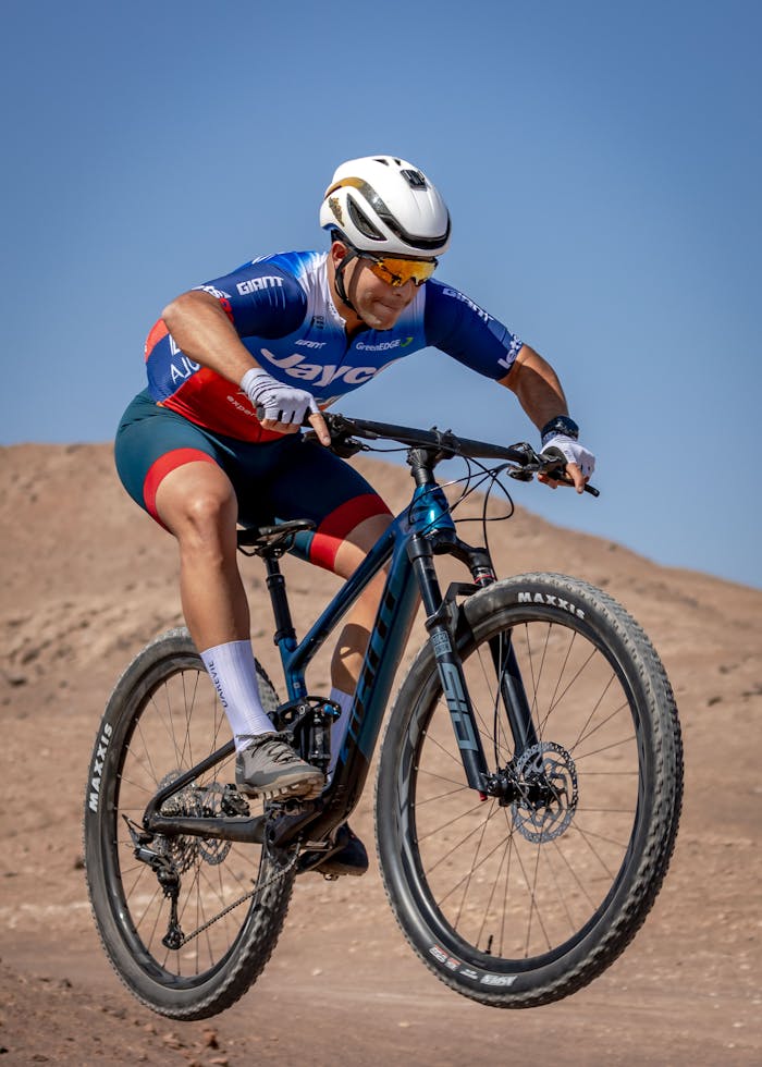 cyclist-riding-mountain-bike-25853503 Dynamic shot of a cyclist jumping on a mountain bike in Alto Hospicio, Chile.